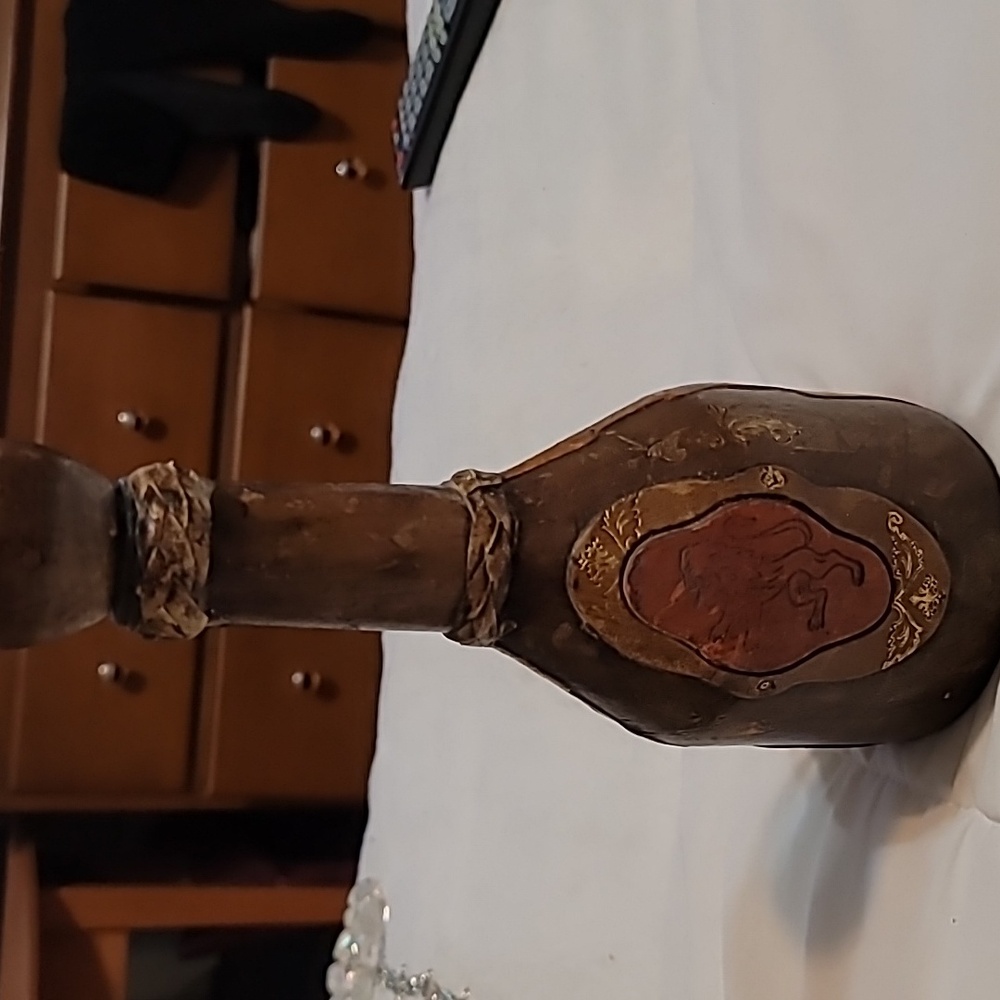 vintage leather decanter leather covered bottle with lion, made in Italy